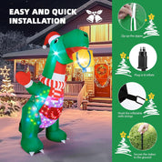 Inflatable dinosaur decoration with LED lights in front of a house decorated for Christmas.