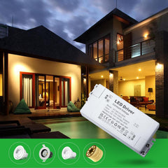 LED driver with a house in the background at night