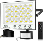 LED flood light with motion sensor and remote control on a white background