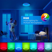 LED light fixture in a room with a couple embracing, displaying RGB color options.