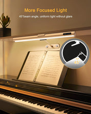 Light fixture on a piano with text about focused light and beam angle.