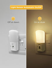 Light sensor night light switch with automatic on/off feature on a gray and brown background.