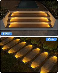 Lighting fixtures on steps and pathway at night
