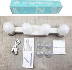 Makeup mirror light with packaging, USB cable, and suction cups on a textured surface
