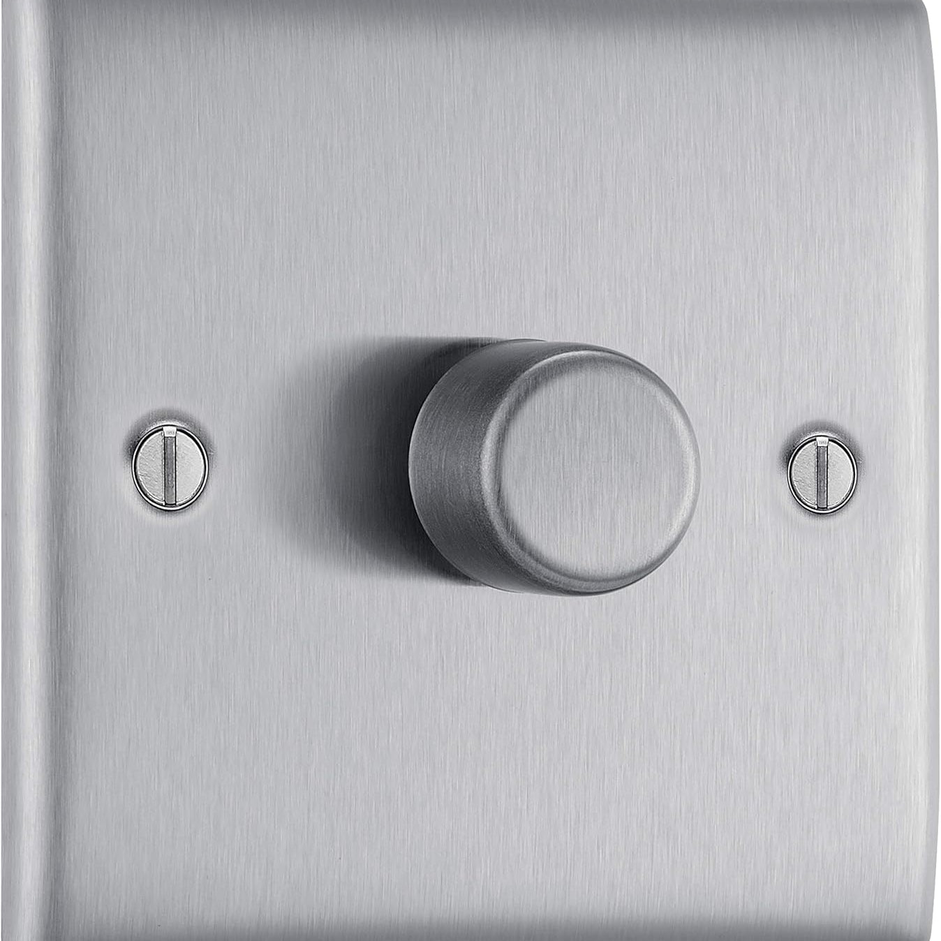 Metallic dimmer switch with a knob on a brushed metal background