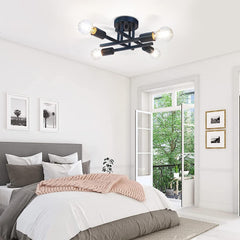 Modern bedroom with a ceiling light fixture, bed, and open door leading to a balcony.