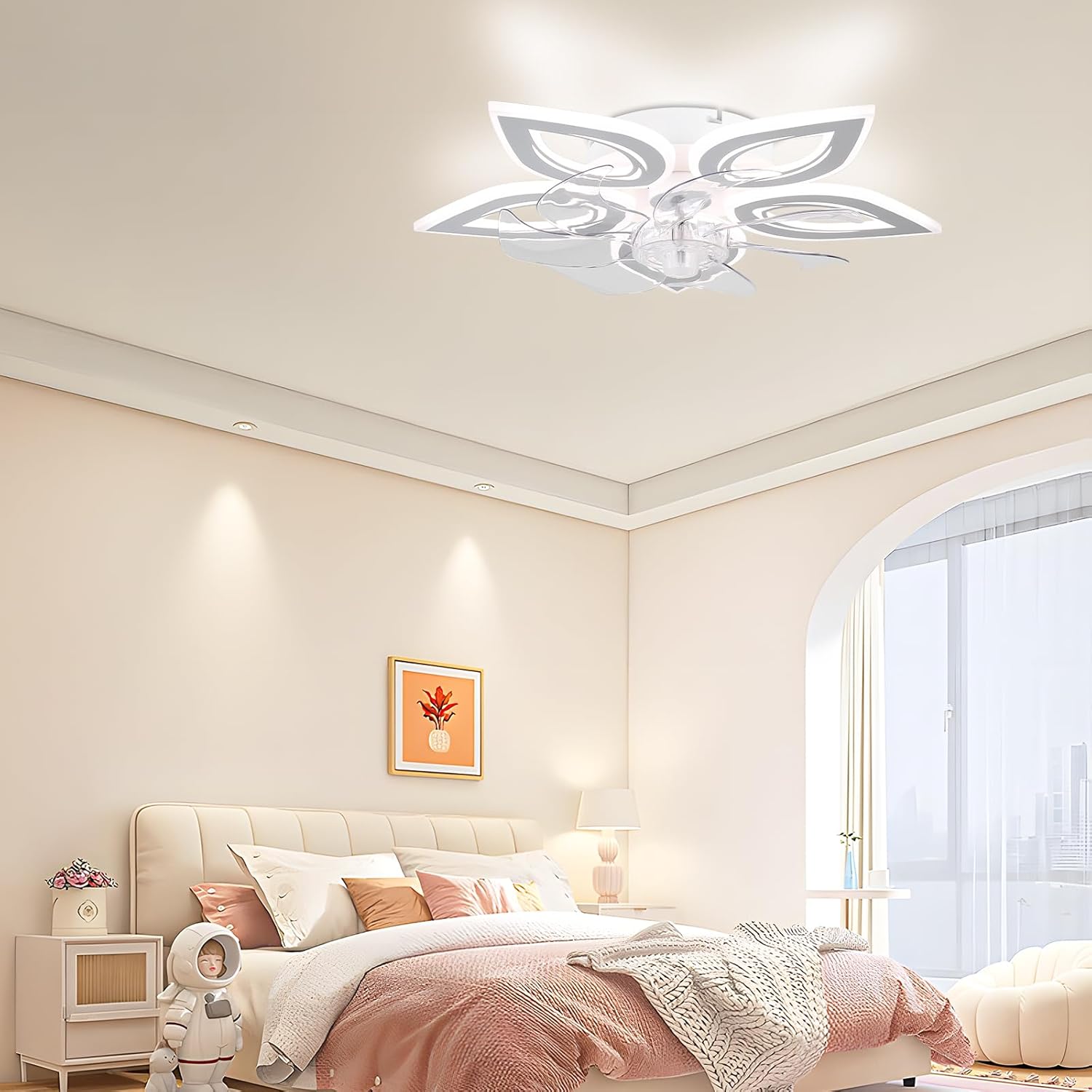 Modern bedroom with a decorative ceiling light fixture.