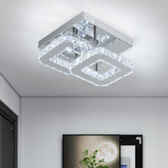 Modern ceiling light fixture with crystal accents in a room setting.