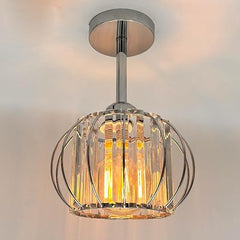 Modern ceiling light fixture with crystal design on a neutral background