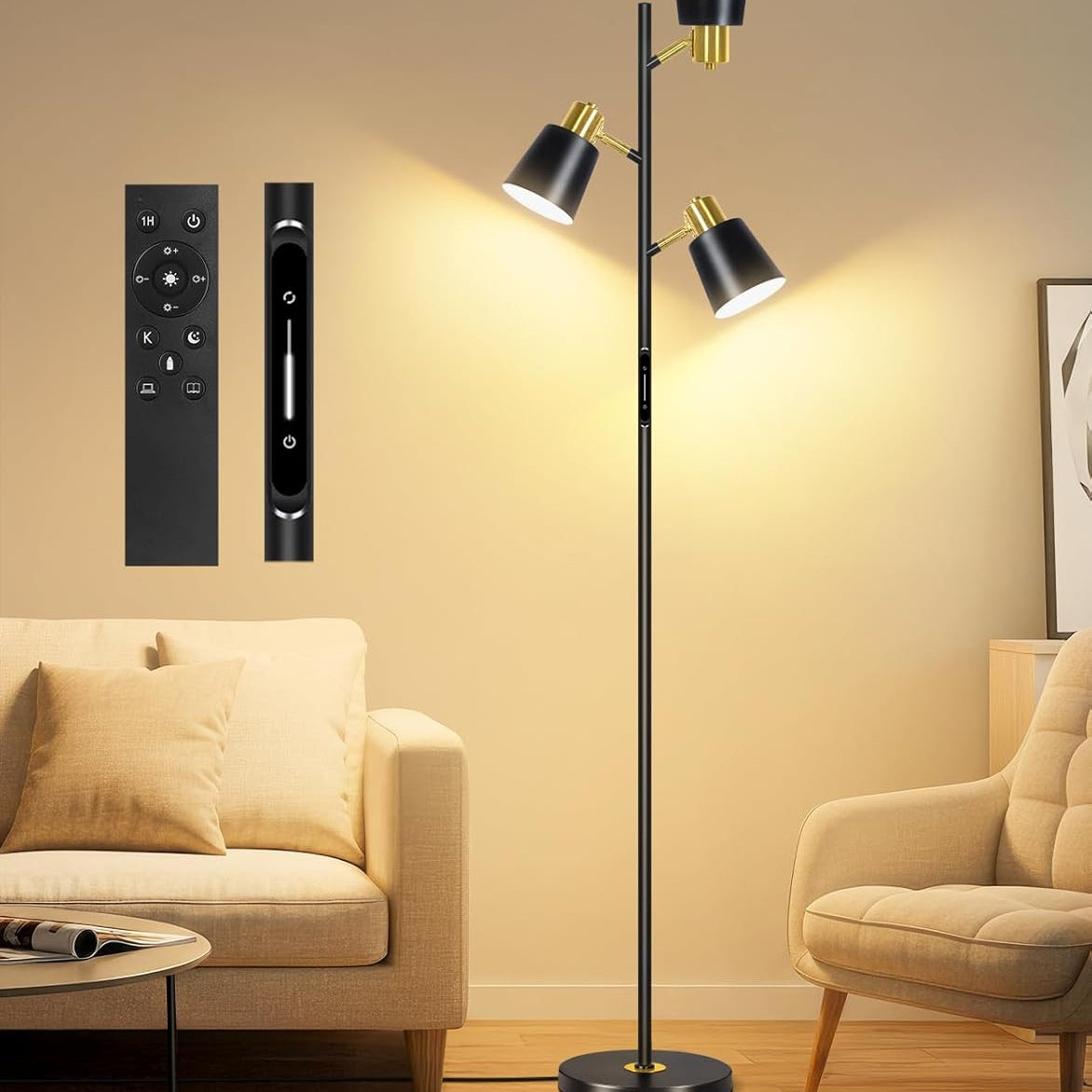 Modern floor lamp with three light fixtures in a living room setting, accompanied by remote controls.