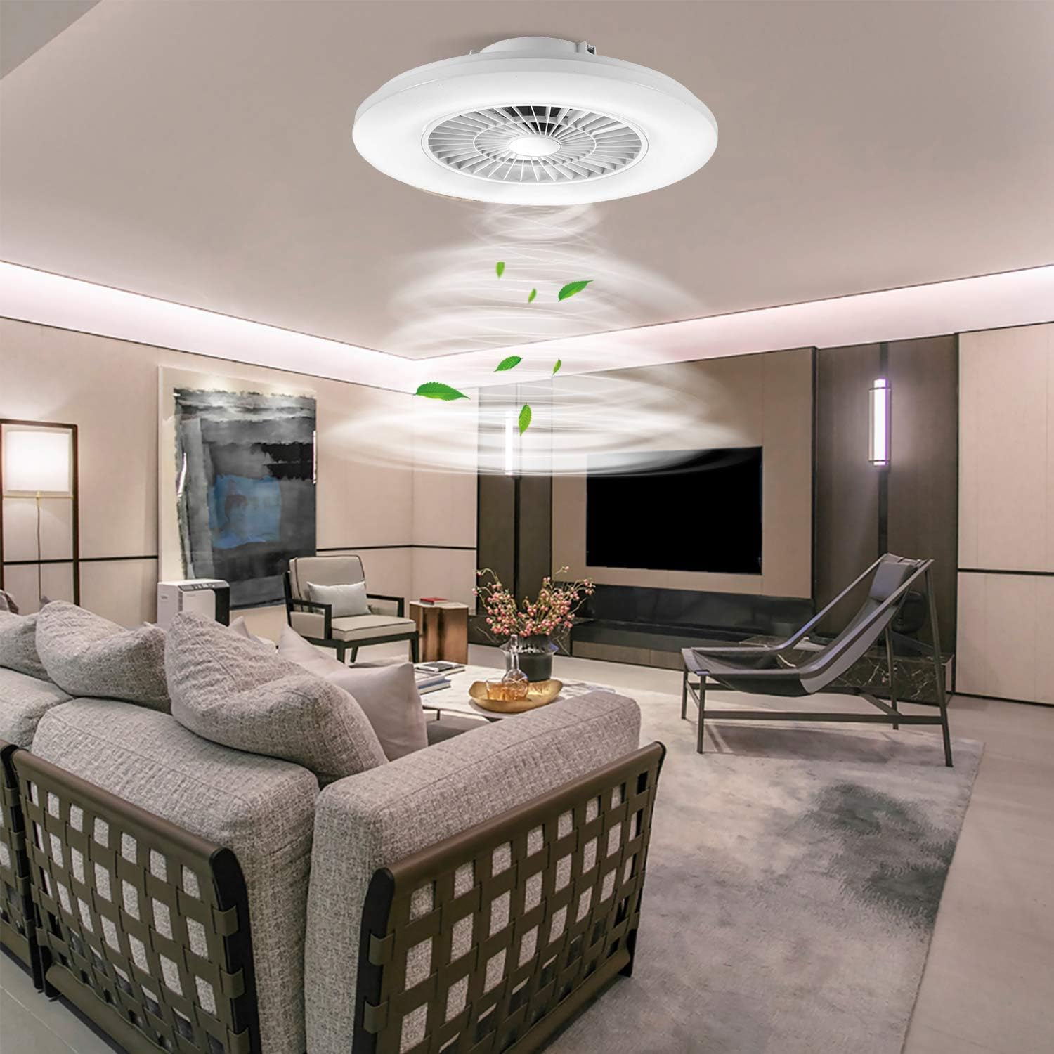 Modern living room with a ceiling fan and decorative elements.