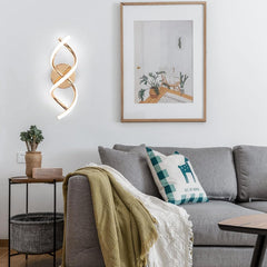 Modern living room with gray sofa, decorative pillows, and wall art.