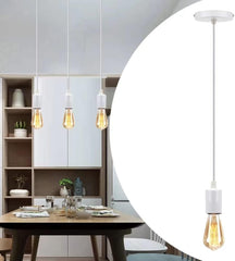 Modern pendant light with a dining table setting in the background