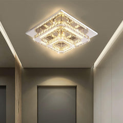 Modern square ceiling light fixture in a hallway