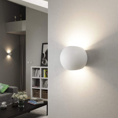 Modern wall-mounted light fixture in a living room setting