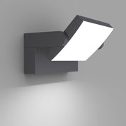Modern wall-mounted light fixture on a gray background