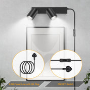 Modern wall-mounted light fixture with power cord and switch on a gray background