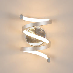 Modern wall light fixture with spiral design on a neutral background