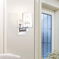 Modern wall sconce on a white wall with a window in the background