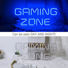 Neon sign with 'Gaming Zone' text on a blue background, and a white 'Gaming Zone' sign on a white surface.