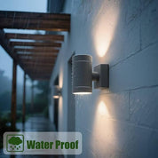 Outdoor wall light fixture on a brick wall with 'Water Proof' label.