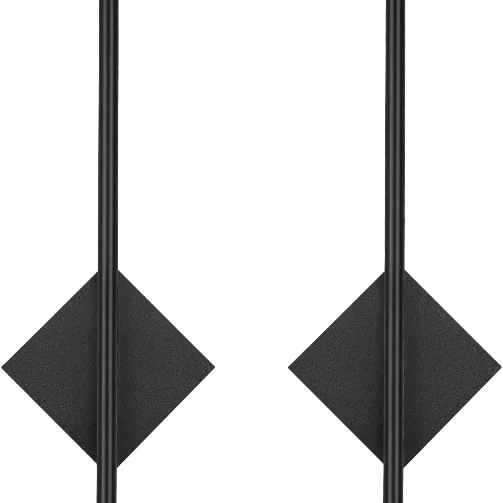 Pair of black earrings with geometric design on a white background