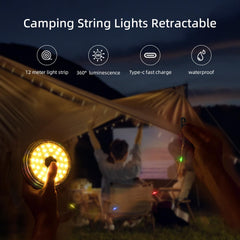 Retractable camping string lights being used at a campsite with a couple watching a movie on a screen.