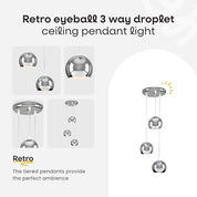 Retro eyeball 3 way droplet ceiling pendant light with tiered pendants on a white background.