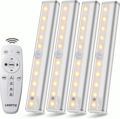 Set of four LED stick-on lights with a remote control on a white background