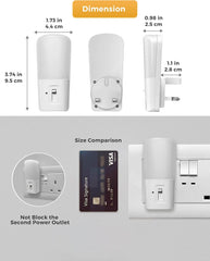 Size comparison of a small electronic device with a Visa card and power outlet.