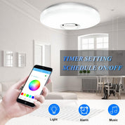 Smart ceiling light control with smartphone app in a modern living room.