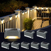 Solar-powered deck lights on a deck with a night-time setting