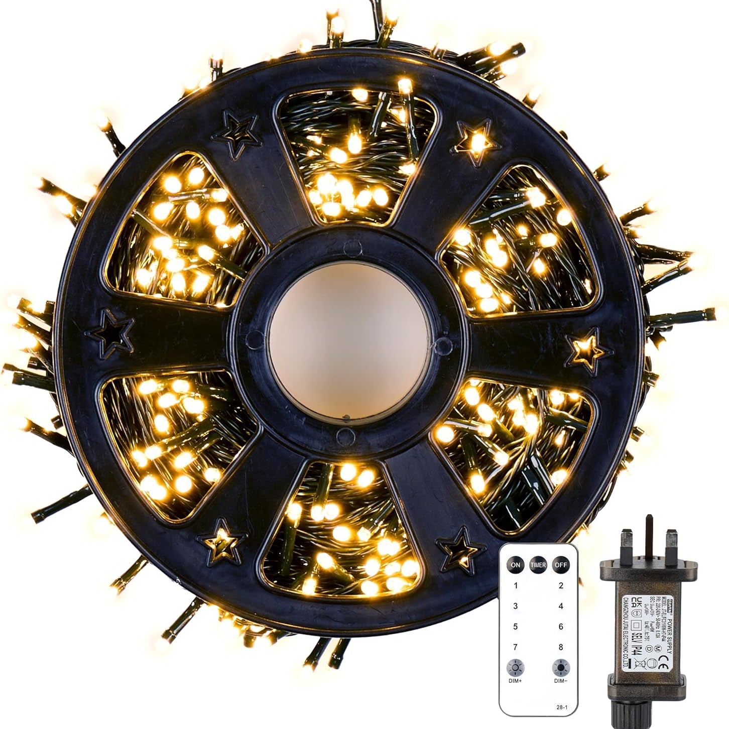 Spool of LED string lights with remote control on a white background