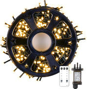 Spool of LED string lights with remote control on a white background