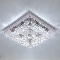 Square crystal ceiling light fixture on a white ceiling