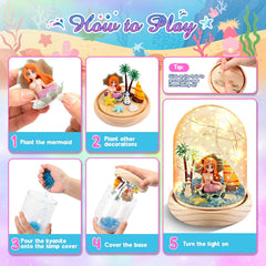 Step-by-step guide on how to play with a mermaid-themed decorative set, including planting mermaids and decorations.