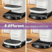 Tassimo coffee machine with black cup stand in four different positions on a wooden surface.