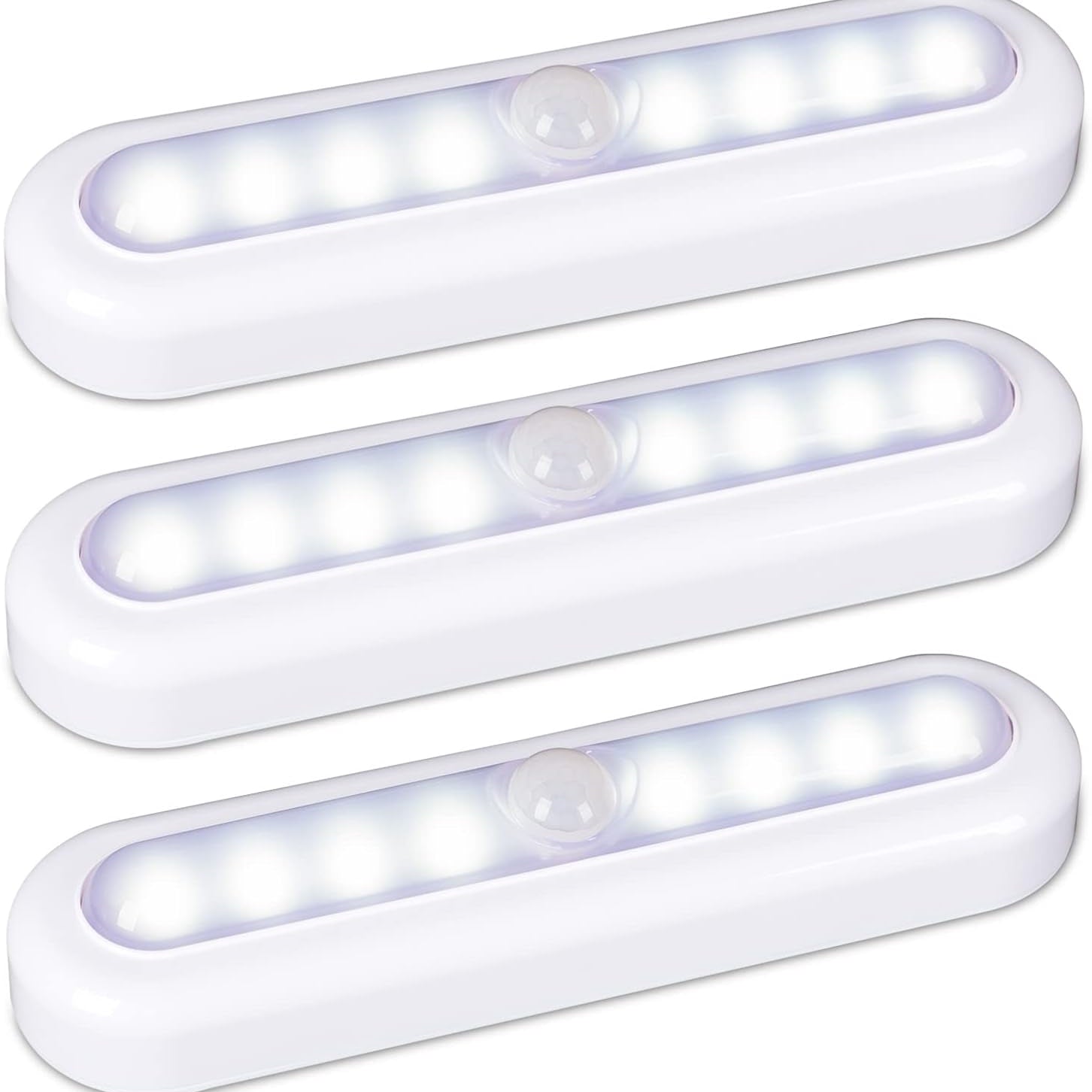 Three white LED motion sensor lights on a white background