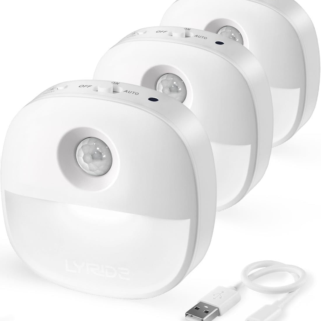 Three white motion sensor lights with a USB cable on a white background