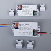 Two LED driver power supplies with connectors on a gray background