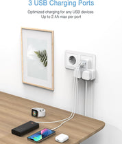 USB charging station with three ports on a wooden desk, featuring a smartphone, smartwatch, and power bank.