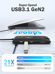USB hub with Super-Speed USB3.1 Gen2 connection, laptop, and speed comparison chart on a light gray background.