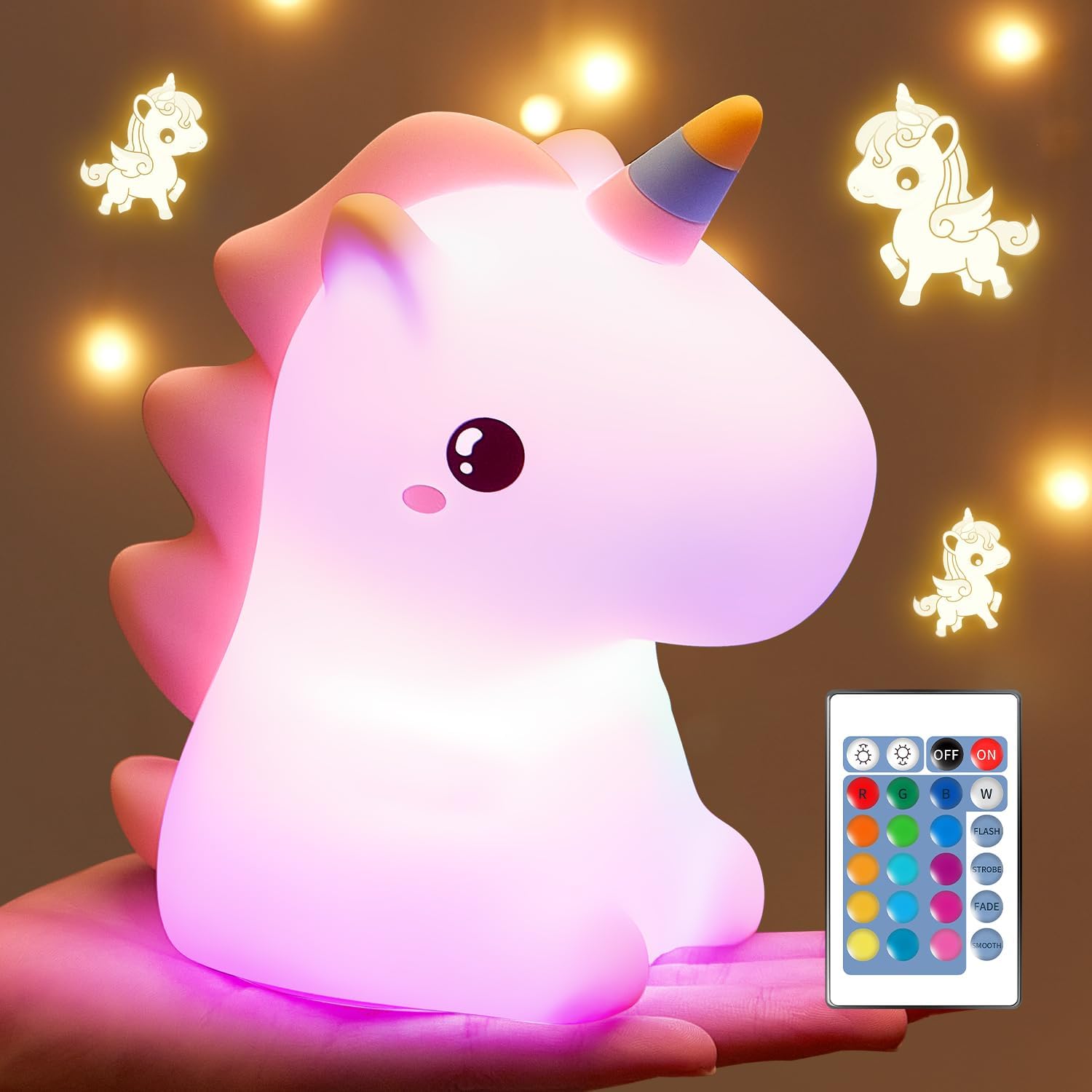 Unicorn-shaped night light with remote control on a brown background