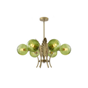Chandelier with green glass shades and gold metal accents on a white background
