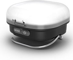 White and black electronic device with mode and power buttons on a white background