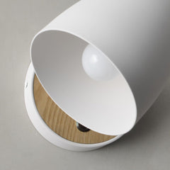 White vintage-style wall light with rotatable aluminum shade and natural wood base, ideal for bedroom, hallway, or living room use.