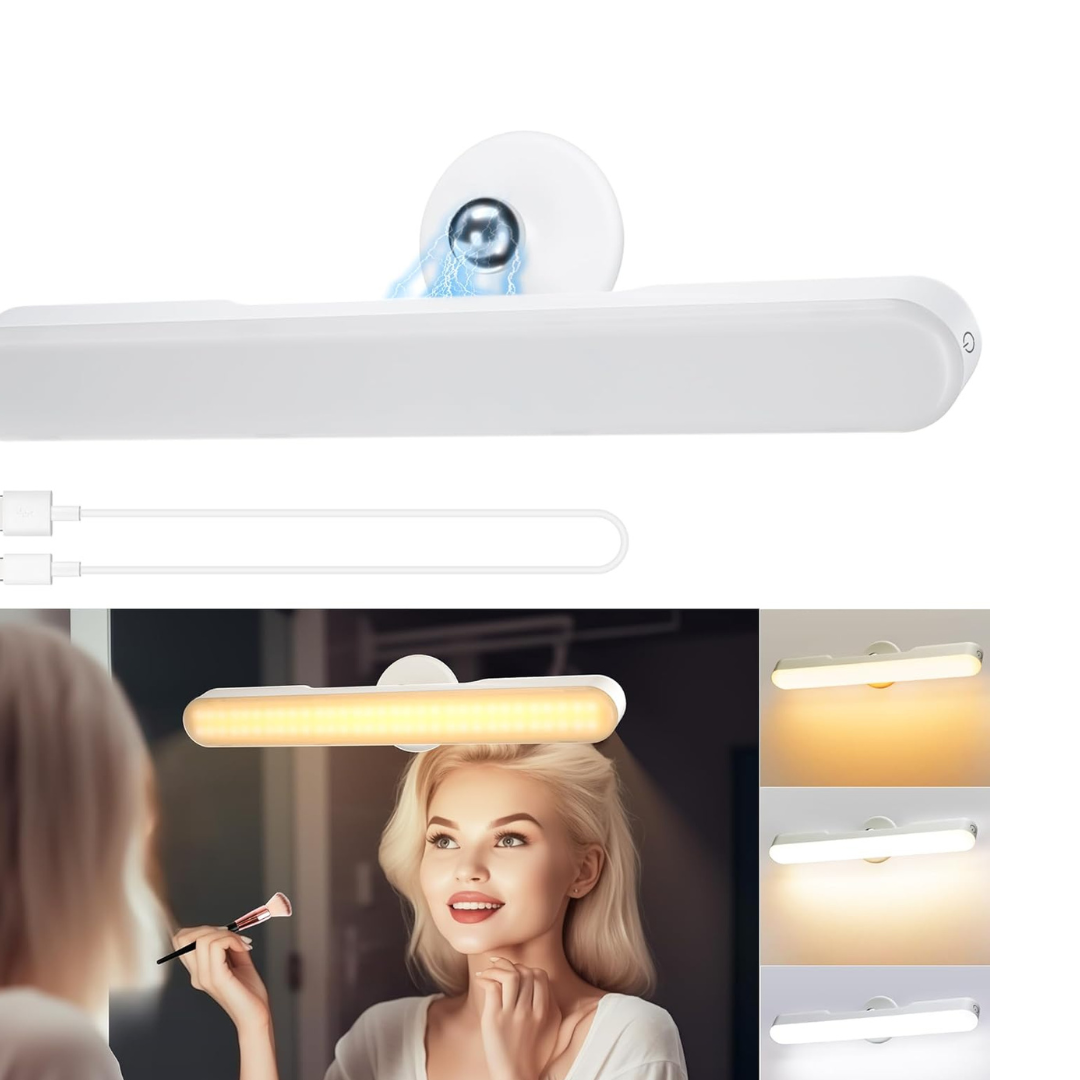 Woman applying makeup in front of a mirror with a light bar above it