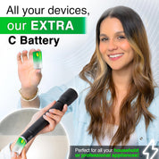 Woman holding a battery and a device with text about an extra C battery for various devices.