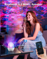 Woman holding a glass of wine with a Bluetooth music speaker and smartphone in a colorful room.