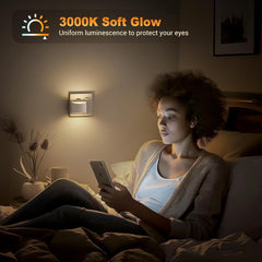 Woman using a smartphone in a dimly lit room with a wall light labeled '3000K Soft Glow'.